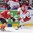 MINSK, BELARUS - MAY 15: Denmark's Nicklas Jensen #17 stickhandles the puck over the blue line with pressure from Canada's Ryan Ellis #4 during preliminary round action at the 2014 IIHF Ice Hockey World Championship. (Photo by Andrea Cardin/HHOF-IIHF Images)

